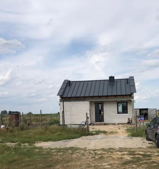Dom przy polu w Owieczkach